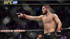 Nothing but respect: Khabib & Poirier don each other’s T-shirts for charity after UFC 242 fight