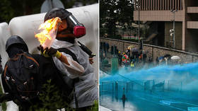 Hong Kong police turn to water cannon as protesters hurl petrol bombs & bricks (PHOTO, VIDEO)