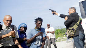 Haitian senator shoots photographer in the FACE amid political chaos in Port-au-Prince (VIDEO)
