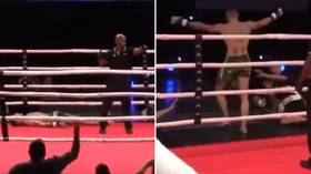 Lights out: MMA fighter gets sparked in the dark as lighting goes haywire at event in Russia (VIDEO)