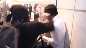 Veiled protester beats JPMorgan banker for saying ‘We are ALL Chinese’ as Hong Kong imposes ban on face masks (VIDEO)