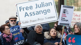 Julian Assange to remain locked up in UK prison following brief court appearance ahead of US extradition hearing