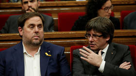 Spanish court jails 9 Catalan separatist leaders for sedition while Puigdemont remains in exile