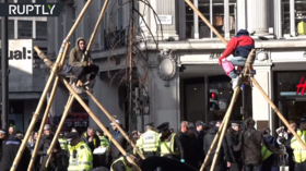 Pyramid scheme: Extinction Rebellion protesters block London’s Oxford Circus with wooden structure (VIDEO)