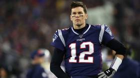 ‘Pretty unlikely’: Brady cools retirement talk despite Patriots’ playoff defeat to Titans signaling end of an era for NFL giants