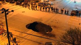 6 killed in China after massive EXPLODING sinkhole swallows bus as passengers board (PHOTOS & VIDEO)