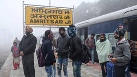 Dozens injured in India as passenger & cargo trains COLLIDE due to thick fog (PHOTOS)