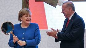 Merkel’s Turkish delights: Erdogan showers German chancellor with gifts as the two meet in Istanbul (PHOTOS)