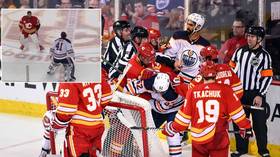 Goalie fight! Rare sight as goaltenders slug it out after ‘Battle of Alberta’ NHL clash erupts into mass brawl (VIDEO)