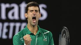 Wizard of Oz: Djokovic stages fightback to beat Thiem and win record-extending EIGHTH Australian Open