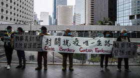 Hong Kong shuts down more border crossings with mainland China amid coronavirus fear, medics strike