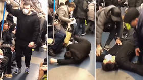 Sick joke: Blogger arrested after brutal coronavirus prank on Moscow subway (VIDEO)