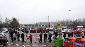 UK supermarkets SWAMPED with panic buyers amid Covid-19 crisis, as product rationing falls on deaf ears (VIDEOS, PHOTOS)