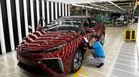 Global automakers halt production at US plants as part of virus containment effort