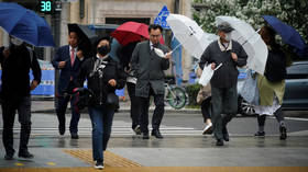 S. Koreans return to work and shops as govt eases social distancing rules