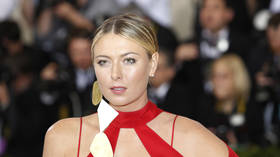 'It's lit!' Maria Sharapova shows fans how she keeps herself in shape by filming a 'sweat sesh' inside her Florida home (VIDEO)