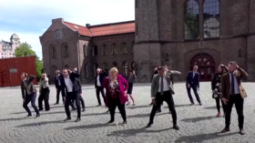 ‘They used to be Vikings’: Norwegian PM & ministers earn praise & ridicule for festive dance video