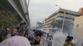 Riot police fire tear gas at protesters outside Miami Police Department (VIDEOS)