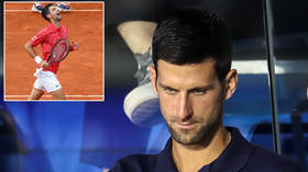 'Our wish is that you die': CHILLING messages to tennis ace Djokovic daubed on street walls after World No.1's coronavius fiasco