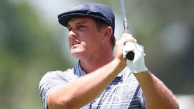 Teed off! Golfer Bryson DeChambeau rages at cameraman for 'damaging' his 'brand' as he filmed errant bunker shot