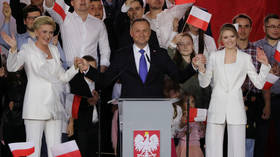 Poland’s President Andrzej Duda slightly ahead of his rival in tight runoff – exit polls