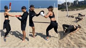 'Hello outdoor workout!' Maria Sharapova boxes on the beach as retired star proves she's in fighting shape (VIDEO)