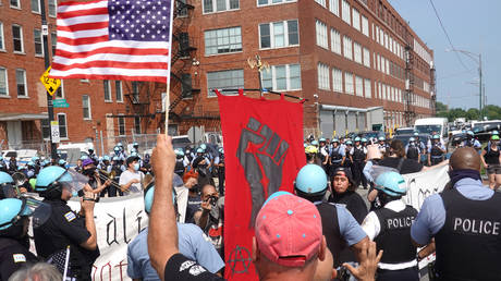 FILE PHOTO: Police separate pro and anti police demonstrators during a protest on August 15, 2020 in Chicago, Illinois