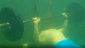 Russian sports instructor sets STUNNING new Guinness World Record… UNDERWATER! (VIDEO)