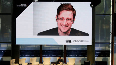 NSA whistleblower Edward Snowden speaks via video link during the Estoril Conferences in Portugal (May 30, 2017 file photo.)
