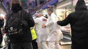 WATCH: Butchers chase animal rights activists out of London meat market