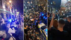 Disgust & applause after huge crowds swarm Liverpool ahead of ‘tier 3’ coronavirus lockdown (VIDEOS)