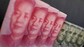 China may be ramping up de-dollarization by dumping US Treasuries, experts say
