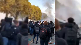 Violence erupts as high-school students clash with police on streets of Paris (VIDEO)