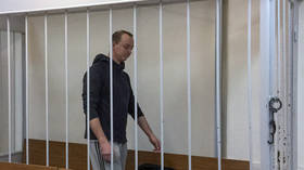 Russian journalist accused of selling secrets to NATO remanded in custody as treason investigation gets underway