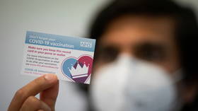 ‘Discriminatory & wrong’: UK health official insists ‘no plans’ for Covid vaccine passports amid growing fears of mandatory jabs