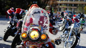 Tokyo bikers club in Santa outfits ride through city to raise awareness of violence against children (PHOTOS)