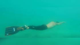 Longest dive on a single breath: Danish sensation swims 202 METERS under water to set new world record (VIDEO)