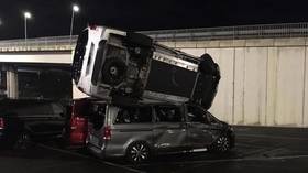 Former employee steals industrial loader & destroys 50 vans after ramming gate at Mercedes-Benz factory in Spain