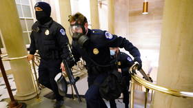 Trump supporters in ARMED STANDOFF with police inside US Capitol as offices evacuated & lawmakers told to don gas masks - reports