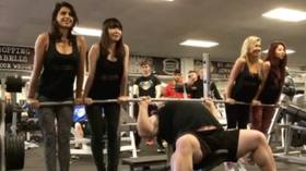 WATCH: Strongman Eddie Hall bench-presses FOUR women in show of strength as he prepares for boxing bout with Game of Thrones giant