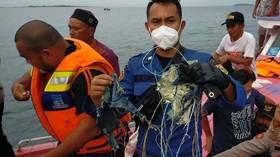 Searchers find debris during operation to locate missing Boeing jet in Indonesia (VIDEO)