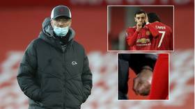 ‘He can’t even look at him!’ Fans in hysterics at image of clenched-fist Klopp & Fernandes after Man Utd dump Liverpool out of cup