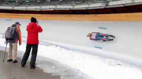 Tough sledding: Russian European champion lugers endure disqualification for using their HANDS at World Championship event (VIDEO)