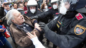 Clashes, arrests as thousands face off with riot police at protest against Covid-19 lockdown in Vienna