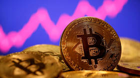 Bitcoin hits $60k record high as cryptocurrency’s rally continues