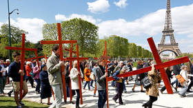 France urges people not to gather over Easter as Covid surges, but religious services will be held