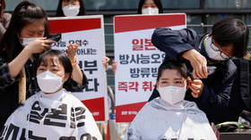 Seoul students shave heads in front of Japanese embassy to protest Tokyo’s plan for dumping Fukushima nuclear wastewater