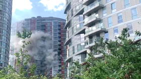 19-storey tower block reportedly clad with flammable panelling catches fire in London (VIDEO)