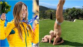 Aussie Olympic legend responds after being accused of ‘craving attention’ with headstand breastfeeding photo