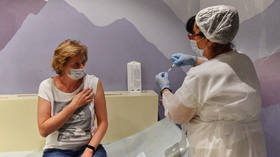Despite deteriorating Covid-19 situation in Russia, Putin says he's still opposed to policy of nationwide compulsory vaccination